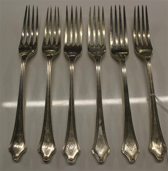 Matched set of six Art Deco silver forks, with trefoil finials inscribed monogram